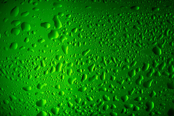 Texture water drops on the bottle of beer.