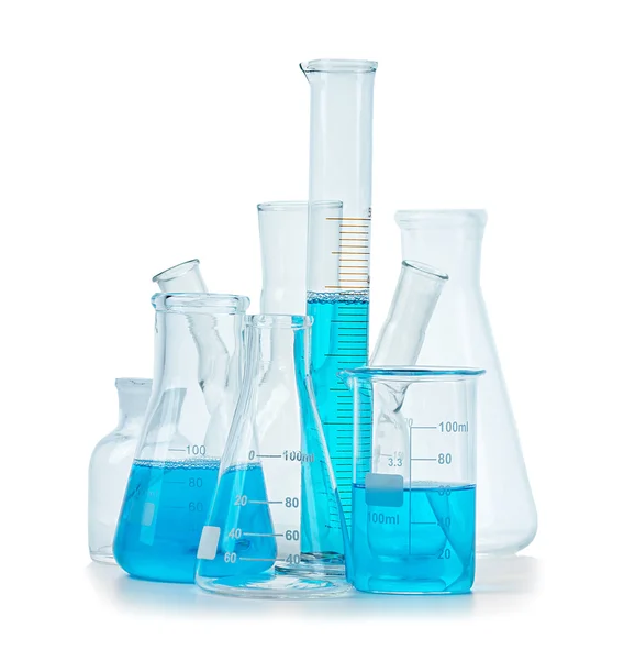 Test-tubes, flasks with blue liquid isolated on white — Stock Photo, Image