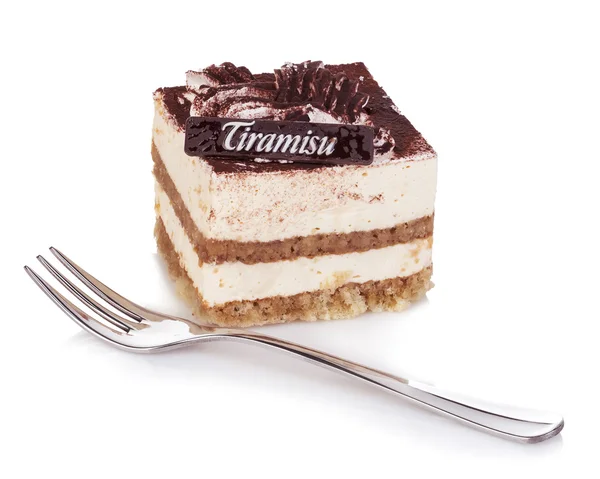 Tiramisu-Dessert mit Gabel in Nahaufnahme auf weißem Hintergrund. — Stockfoto