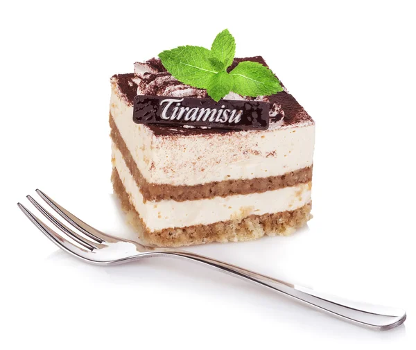 Tiramisu dessert versierd met mint close-up van de bladeren op een witte achtergrond. Stockfoto