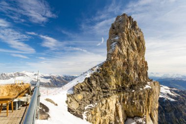 Bizarre rock formation - la quille du diable (Devil Needle) on Swiss alps near the Glacier 3000, Canton Vaud, Switzerland clipart