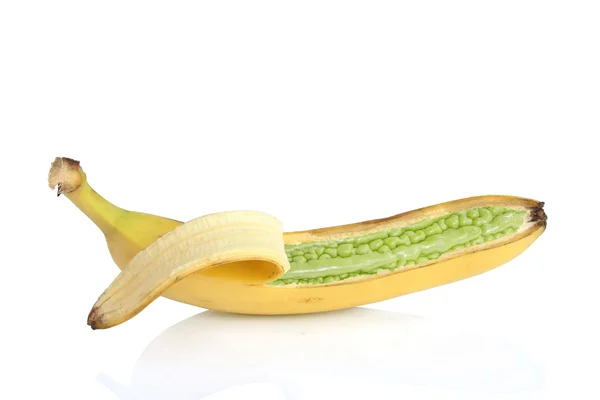GMO food - bitter gourd growing in banana with reflection on white background — Stock Photo, Image
