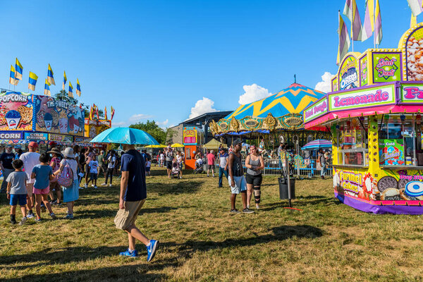 WEST WINDSOR, NEW JERSEY - JULY 4: People enjoy a sunny day at the Mercer County Fair on July 4 2021 in West Windsor New Jersey.