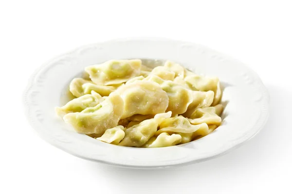 Kokt Dumplings på vit platta — Stockfoto