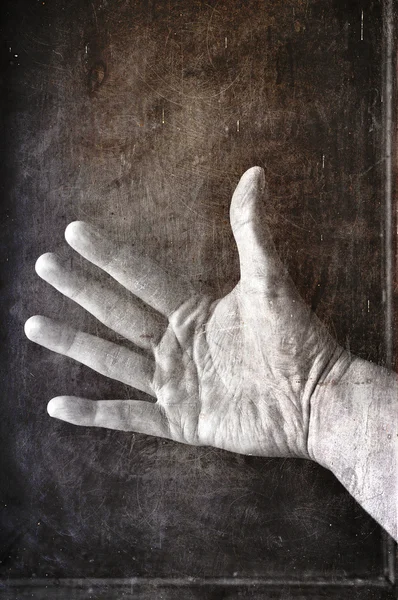 Grungy hand — Stockfoto
