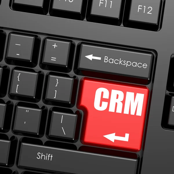 Красная кнопка ввода на клавиатуре компьютера, CRM слово — стоковое фото