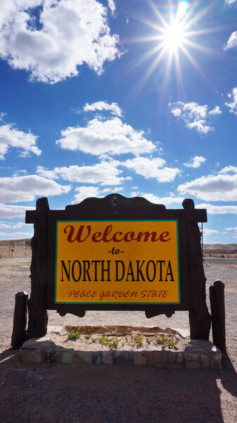 Welcome to North Dakota road sign