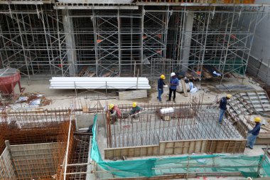 Singapur 'daki inşaat alanında çalışanlar