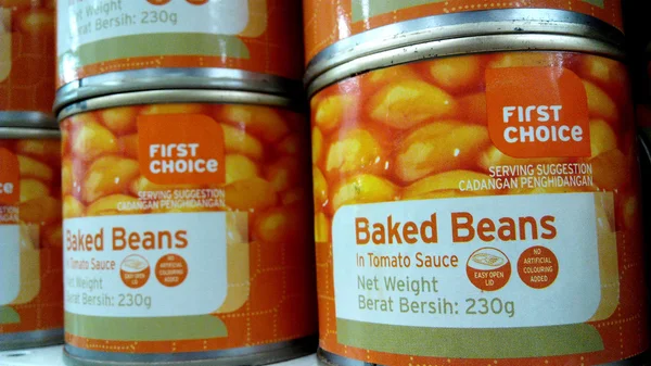 Baked beans are commonly eaten on toast or as part of a full Eng — Stock Photo, Image