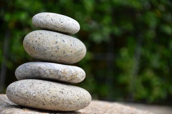 Stack of zen rocks in garden — Stock Photo, Image