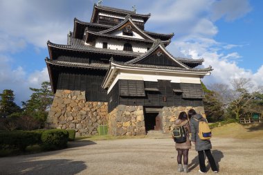 Tourists visit Matsue samurai feudal castle clipart