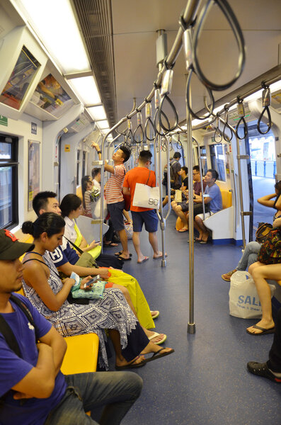 Passengers ride on subway train