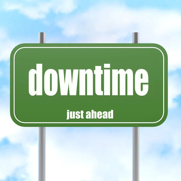 Groene verkeersbord met downtime woord — Stockfoto
