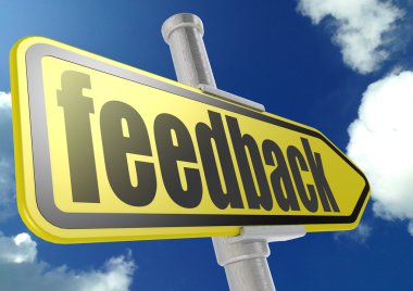 Yellow road sign with feedback word under blue sky
