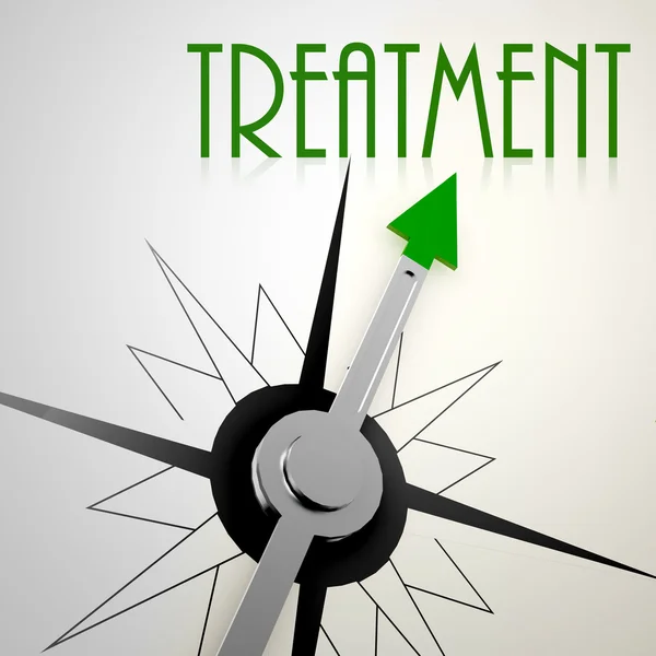 Treatment on green compass — Stockfoto