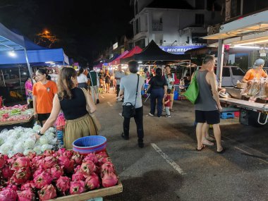 Johor Bahru, Malaysia- 2 Oct 2025:  People visit to a local night market in Johor Bahru, Malaysia. Also called as pasar malam, it is a popular place for local people to shop