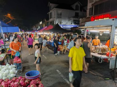 Johor Bahru, Malaysia- 2 Oct 2025:  People visit to a local night market in Johor Bahru, Malaysia. Also called as pasar malam, it is a popular place for local people to shop