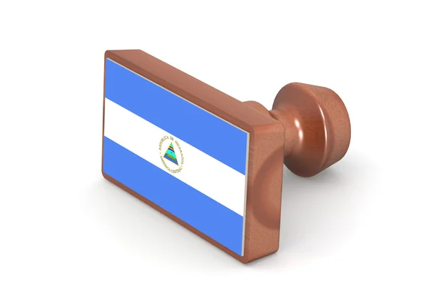 Wooden stamp with Nicaragua flag — 图库照片