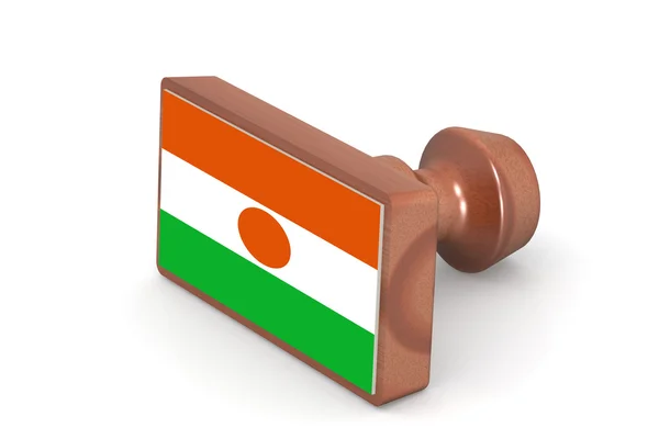 Wooden stamp with Niger flag — стокове фото