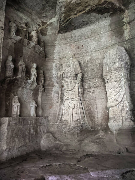 Rock sculptures of Buddha at Beishan Rock Carvings in Dazu, China. Dazu Rock Carvings have over 50,000 statues, integrating Buddhism, Daoism, and Confucianism.