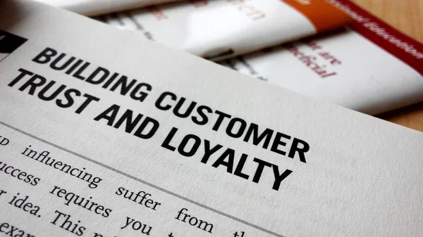 Buiding customer trust and loyalty word on a book — Stock Photo, Image