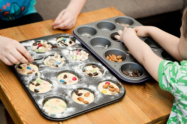 Boy Decorating Cupcake Taking Sprinkles Nuts Decorations Baking Form Baking Stock Image