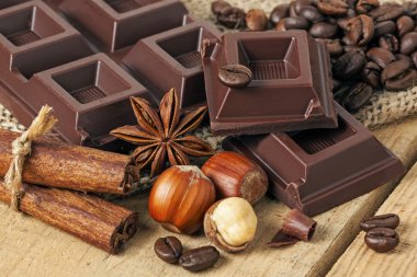 Chocolate with wood background  clipart
