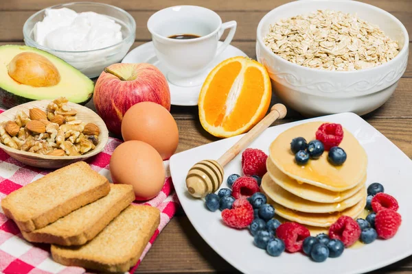 Healthy Breakfast Background Coffee Pancakes Fresh Berries Eggs Avocado Greek — Stockfoto