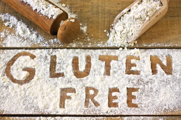 Mot sans gluten avec fond en bois — Photo