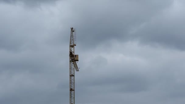 Crane on a background cloudy sky. Time Lapse — Stock Video