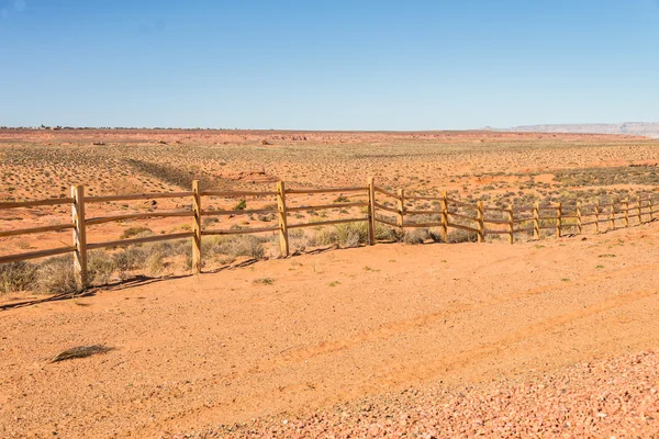 Old wooden fence in countryside of desert — Stock Photo, Image