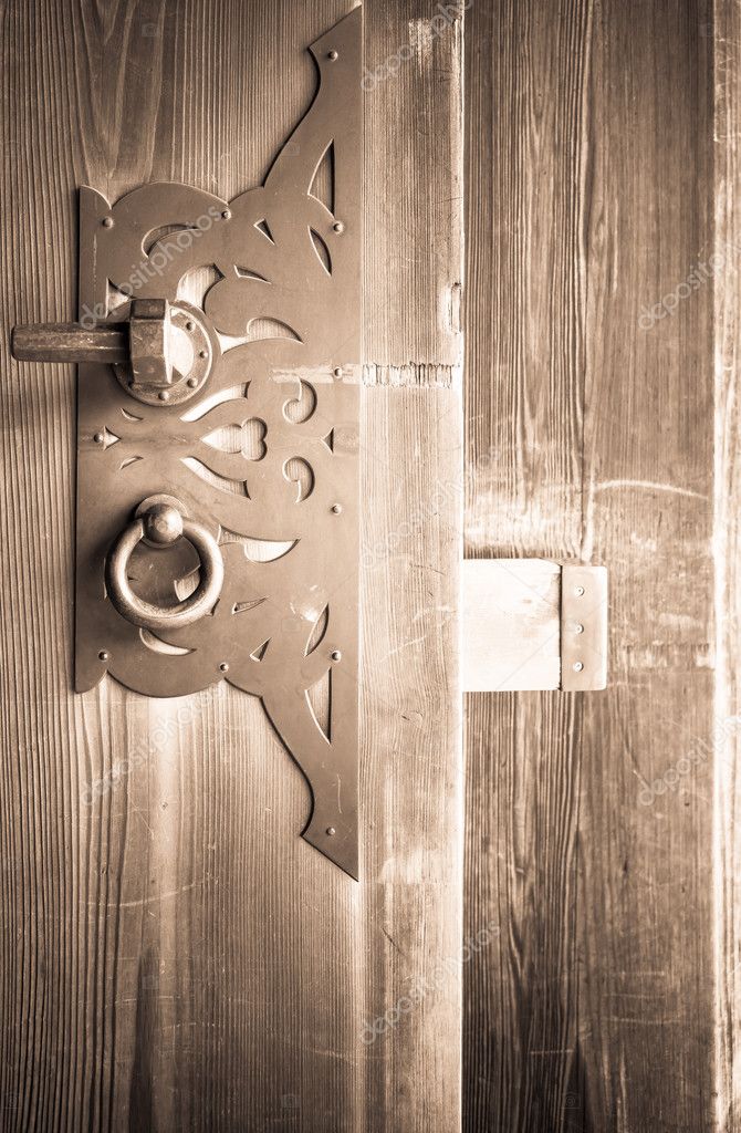 Old Wooden Door Decorate With Brass Handles In Japanese