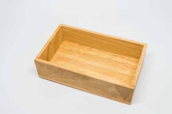 Wooden box on white background with selective focus — Stock Photo, Image