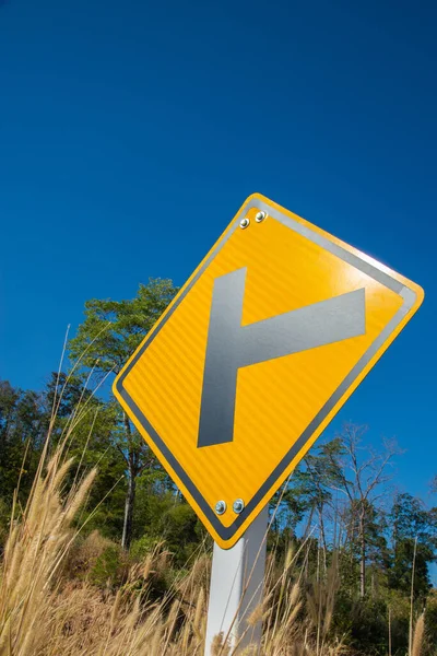 Yellow Cross Section Traffic Sign Countryside Dried Grass Blue Sky — Stock Photo, Image