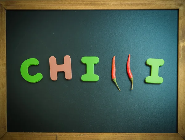 Chilli wooden word on black board 2 — Stock Photo, Image
