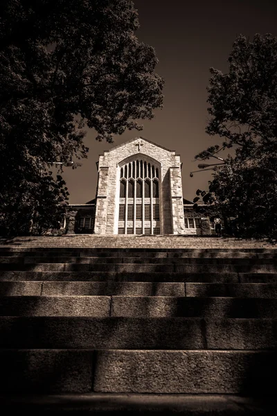 Velha igreja bonita em estilo sépia escuro — Fotografia de Stock