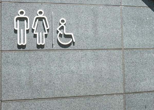 Toaletten symbol på mable vägg — Stockfoto