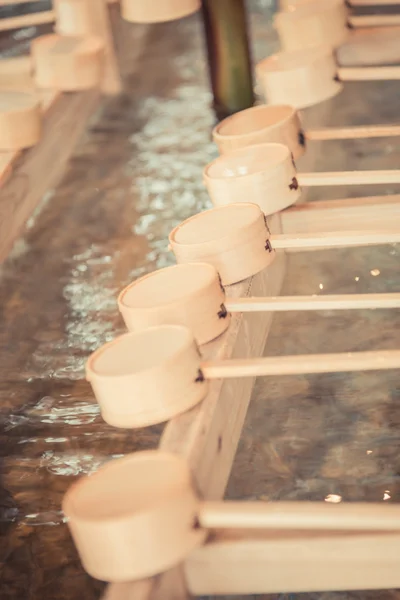 Bamboo Japanese purification ladle at entrance of Japanese Temple in Vintage style — Stock Photo, Image