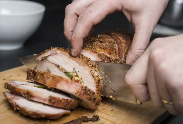 Slicing pork fillet — Stock Photo, Image