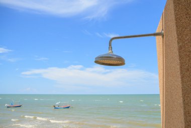  Deniz ile duş başlığı 