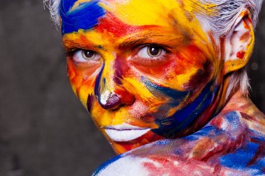 Human Canvas Girl face with Art body painting
