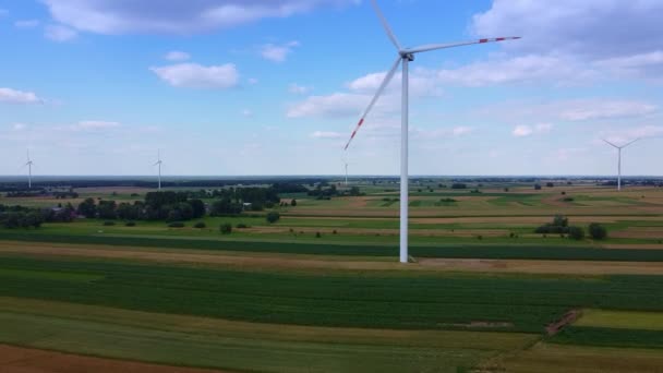 Arrays of large turbines from a drone in summer — Stock Video