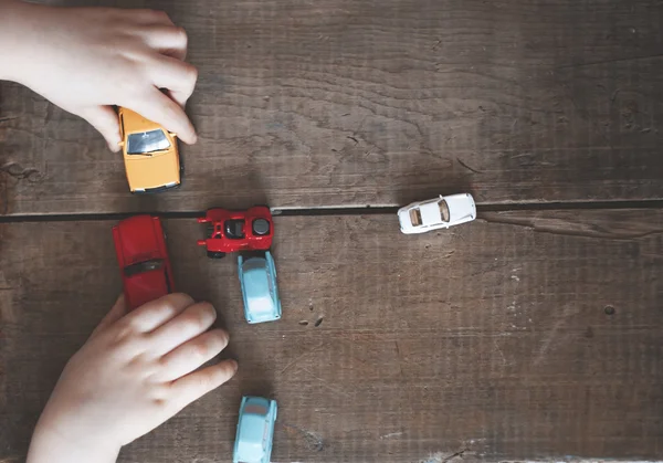 Boy playing with his cars — Stock Photo, Image