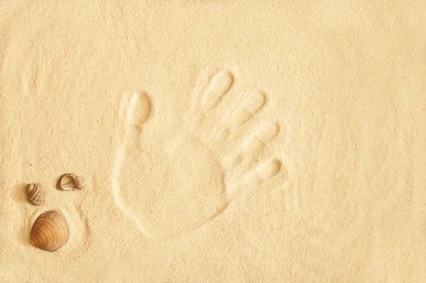 Empreinte main sur sable — Photo