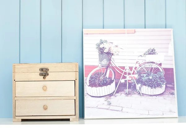 Vintage poster and ancient wooden jewelry box — Stock fotografie