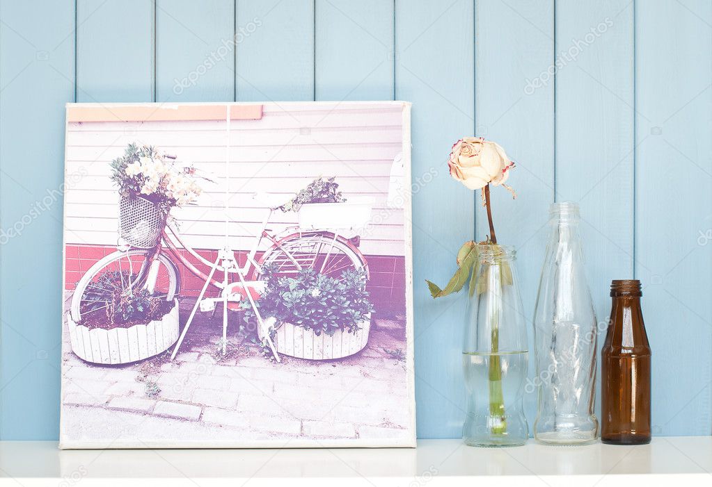 Vintage poster with bicycle flowerbed, single rose and collectio