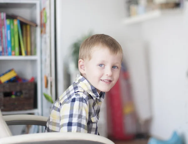 Cheerful child in children's room — Stok fotoğraf