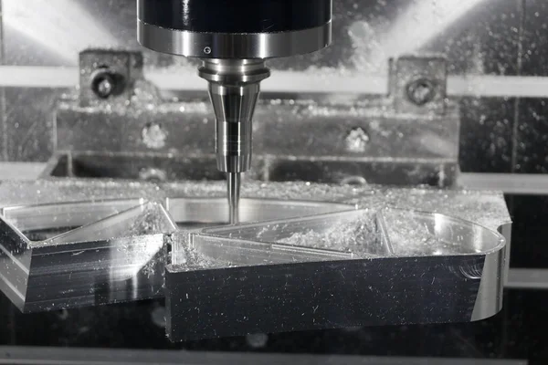 Manufacturing process with a CNC milling machine. Selective focus.