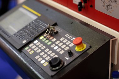 CNC lathe machine control panel close up. Selective focus.