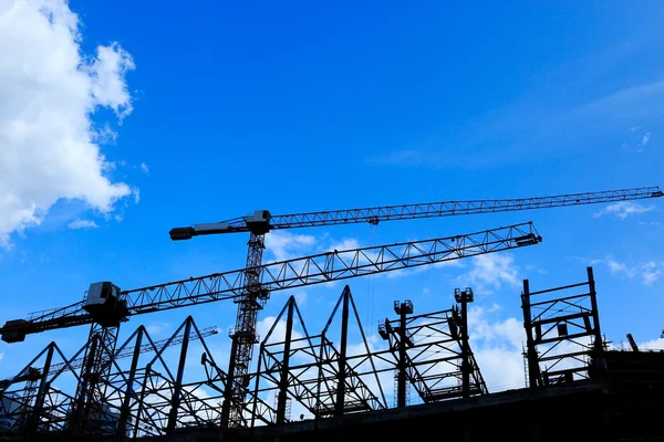 Silhouetted construction site — Stock Photo, Image